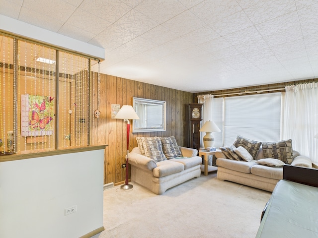 11314 S Green Bay Ave, Chicago, IL 60617 - carpeted living room featuring wood walls and baseboards
