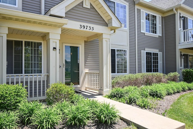39735 N Paris Dr, Beach Park, IL 60083 - property entrance with covered porch and roof with shingles
