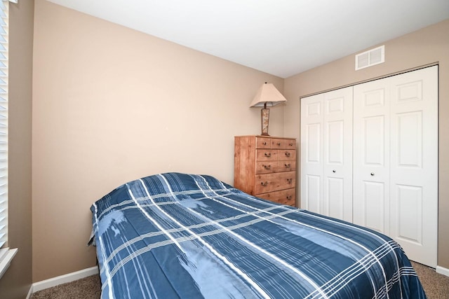 39735 N Paris Dr, Beach Park, IL 60083 - carpeted bedroom with baseboards and a closet