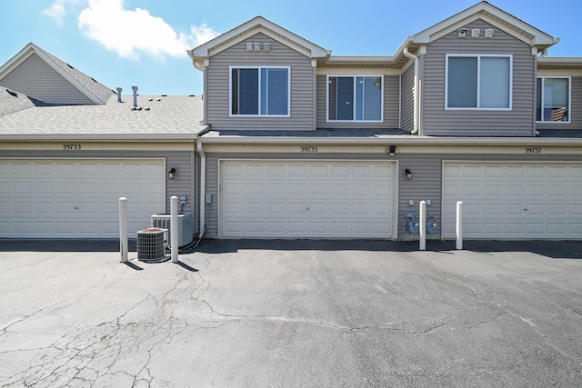 39735 N Paris Dr, Beach Park, IL 60083 - garage with cooling unit and driveway