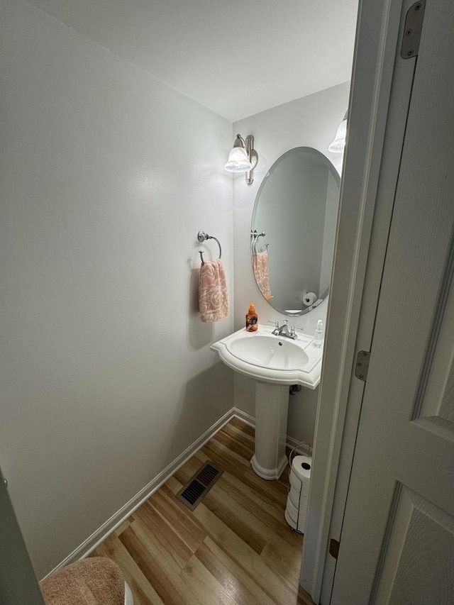 39735 N Paris Dr, Beach Park, IL 60083 - half bath featuring wood finished floors and baseboards