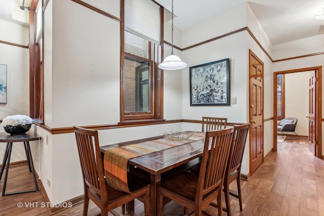 818 N Dearborn St Unit 1R, Chicago, IL 60610 - dining area with wood finished floors and baseboards