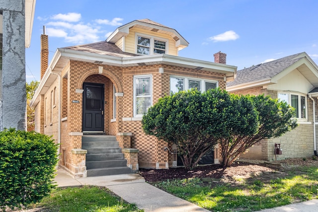 5945 W Dakin St, Chicago, IL 60634 - view of front of property featuring a chimney and brick siding