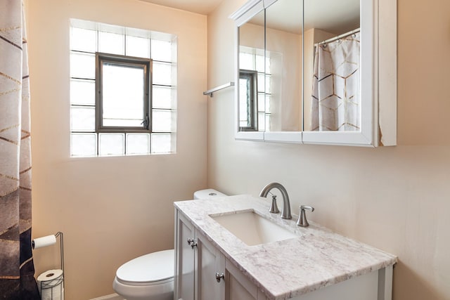 5945 W Dakin St, Chicago, IL 60634 - bathroom with toilet and vanity