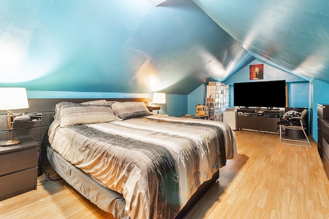 5945 W Dakin St, Chicago, IL 60634 - bedroom with wood finished floors and vaulted ceiling
