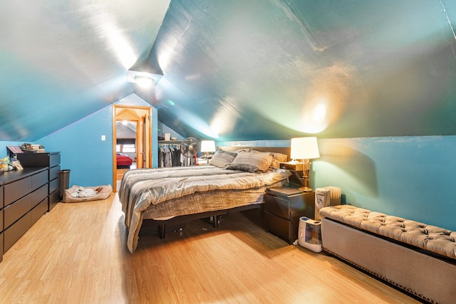 5945 W Dakin St, Chicago, IL 60634 - bedroom with wood finished floors and vaulted ceiling