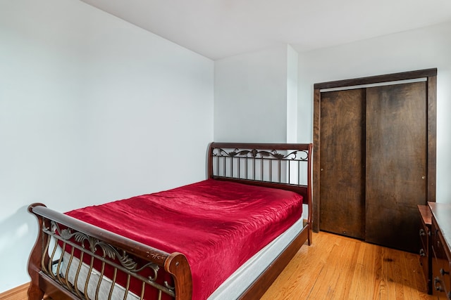 5945 W Dakin St, Chicago, IL 60634 - bedroom featuring wood finished floors, pool table, and a closet