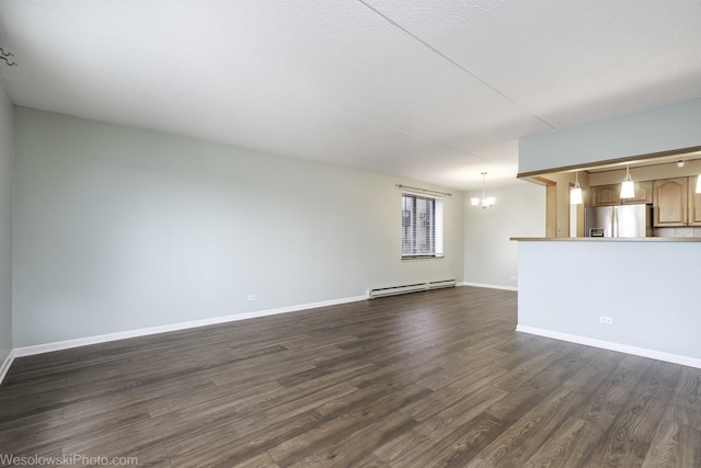 9737 N Fox Glen Dr Unit 4A, Niles, IL 60714 - unfurnished living room with baseboard heating, dark wood-style floors, baseboards, and a chandelier