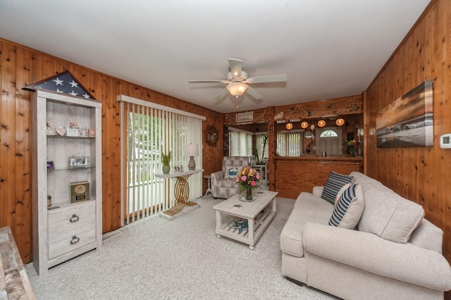 26477 Springwell St, Antioch, IL 60002 - carpeted living area with wooden walls and a ceiling fan