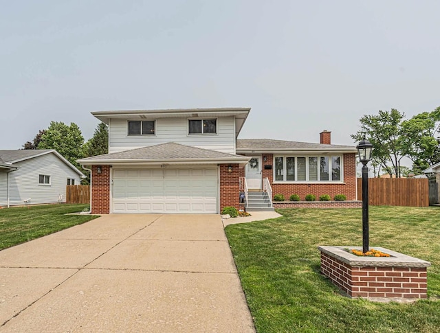 851 Munroe Cir, Des Plaines, IL 60016 - tri-level home featuring brick siding, concrete driveway, a garage, and a chimney