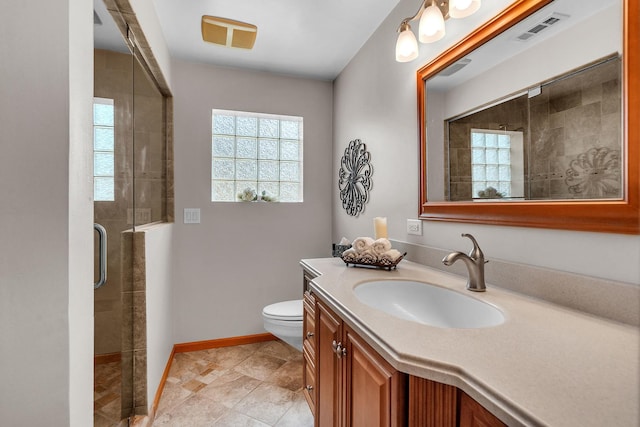 851 Munroe Cir, Des Plaines, IL 60016 - bathroom with plenty of natural light, vanity, toilet, and baseboards