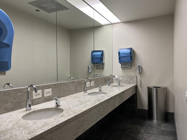474 N Lake Shore Dr Unit 2012, Chicago, IL 60611 - bathroom featuring double vanity and baseboards