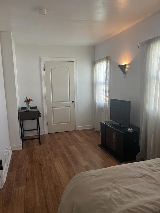 2720 N Budd St, River Grove, IL 60171 - bedroom featuring wood finished floors and baseboards