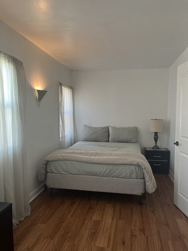 2720 N Budd St, River Grove, IL 60171 - bedroom featuring wood finished floors and baseboards