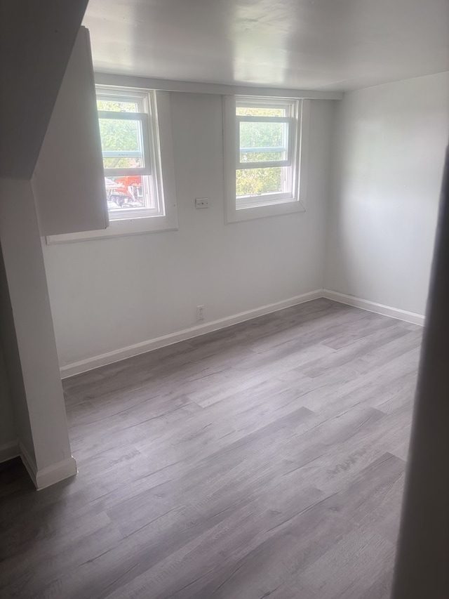 2720 N Budd St, River Grove, IL 60171 - unfurnished room featuring wood finished floors and baseboards