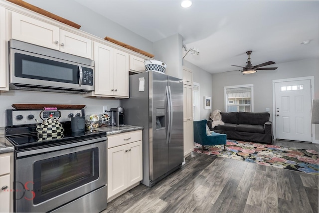 7 Pelican, Ottawa, IL 61350 - kitchen with appliances with stainless steel finishes, dark wood-style floors, white cabinets, and a ceiling fan