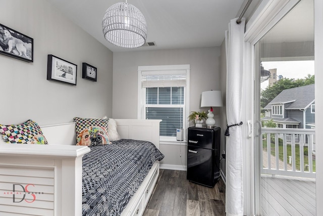 7 Pelican, Ottawa, IL 61350 - bedroom featuring a chandelier and dark wood-style floors