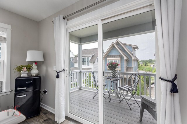 7 Pelican, Ottawa, IL 61350 - doorway to outside featuring wood finished floors, plenty of natural light, and baseboards
