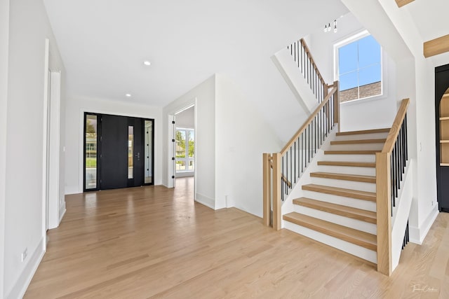 8740 Adria Ct, Orland Park, IL 60462 - entryway with light wood-style floors, stairway, recessed lighting, and baseboards
