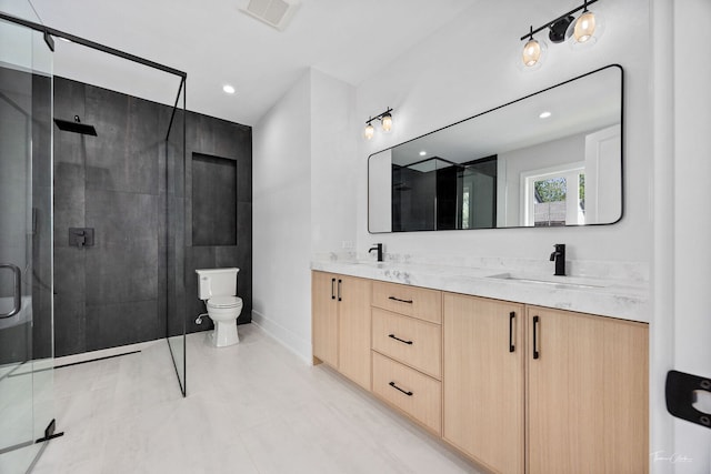 8740 Adria Ct, Orland Park, IL 60462 - bathroom featuring a stall shower, double vanity, toilet, and baseboards