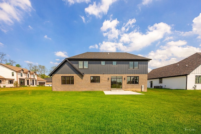 8740 Adria Ct, Orland Park, IL 60462 - rear view of property featuring a patio, brick siding, a yard, and central air condition unit