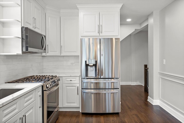 3412 Sunnyside Ave, Brookfield, IL 60513 - kitchen featuring appliances with stainless steel finishes, open shelves, dark wood-style floors, white cabinets, and light stone countertops