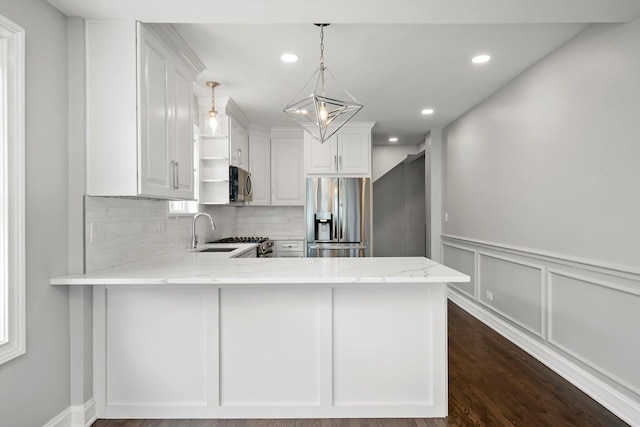 3412 Sunnyside Ave, Brookfield, IL 60513 - kitchen featuring stainless steel appliances, a sink, dark wood-type flooring, light stone countertops, and recessed lighting