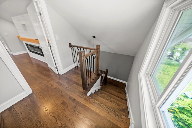 3412 Sunnyside Ave, Brookfield, IL 60513 - staircase with lofted ceiling, plenty of natural light, wood finished floors, and baseboards