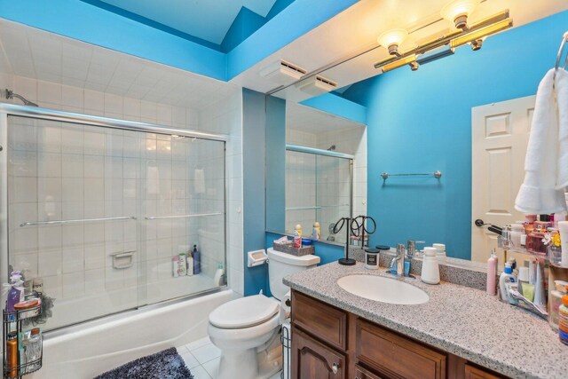 51 Oak Creek Dr, Burr Ridge, IL 60527 - bathroom with tile patterned floors, bath / shower combo with glass door, toilet, and vanity