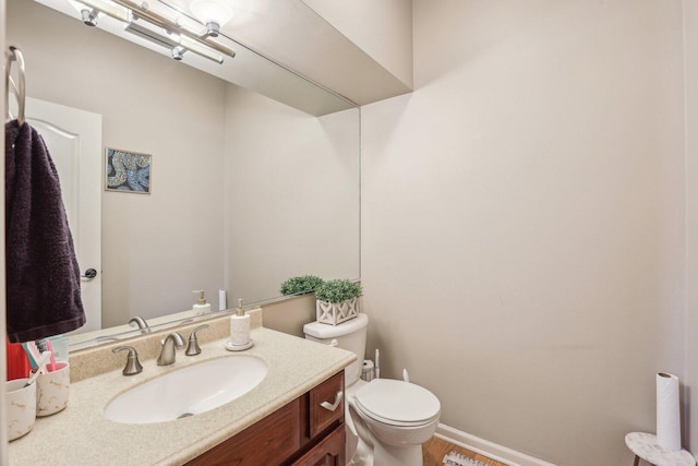 51 Oak Creek Dr, Burr Ridge, IL 60527 - bathroom featuring toilet, vanity, and baseboards
