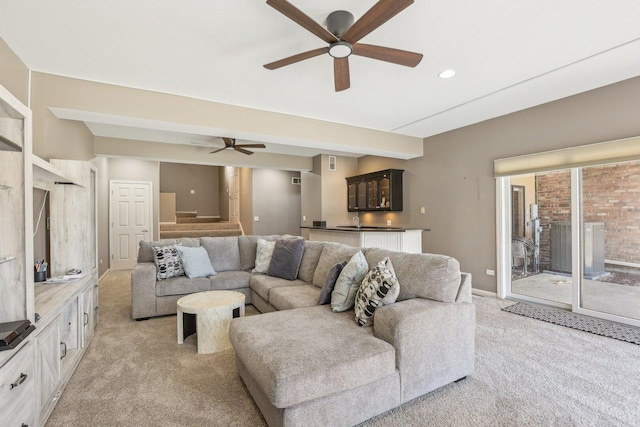 51 Oak Creek Dr, Burr Ridge, IL 60527 - living room with light colored carpet, a ceiling fan, stairway, and recessed lighting
