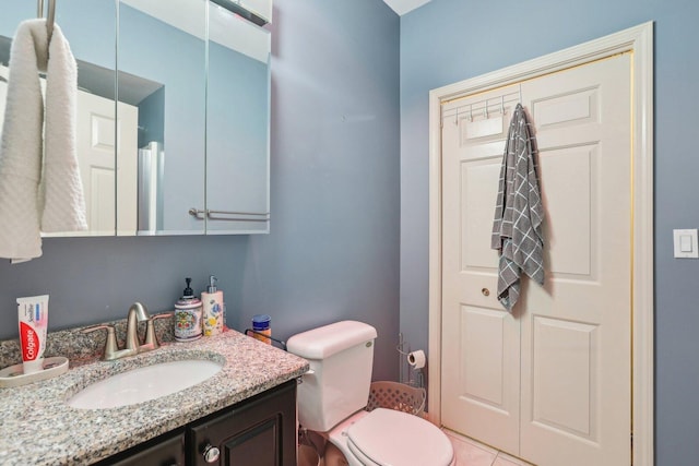 51 Oak Creek Dr, Burr Ridge, IL 60527 - bathroom featuring vanity, toilet, and tile patterned floors