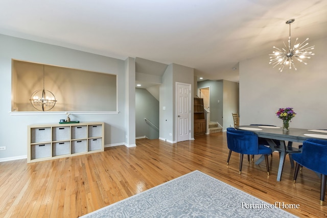 435 N Commerce St, Aurora, IL 60504 - dining space featuring a chandelier, hardwood / wood-style floors, and baseboards