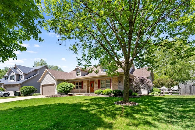 807 Meadow Ln, North Aurora, IL 60542 - view of front of property with brick siding, an attached garage, driveway, and a porch