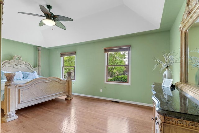 807 Meadow Ln, North Aurora, IL 60542 - bedroom with light wood-type flooring, vaulted ceiling, baseboards, and a ceiling fan