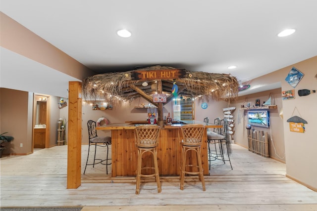 807 Meadow Ln, North Aurora, IL 60542 - indoor bar with light wood-type flooring, recessed lighting, and baseboards