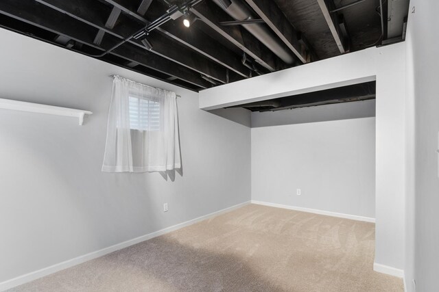 807 Meadow Ln, North Aurora, IL 60542 - basement featuring carpet floors and baseboards