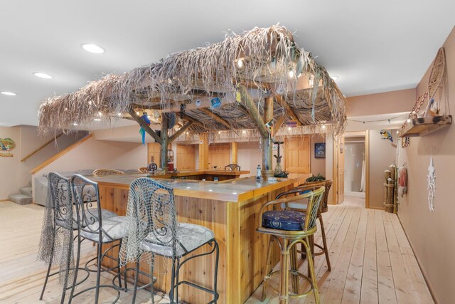 807 Meadow Ln, North Aurora, IL 60542 - indoor bar with wood-type flooring, recessed lighting, stairs, and baseboards