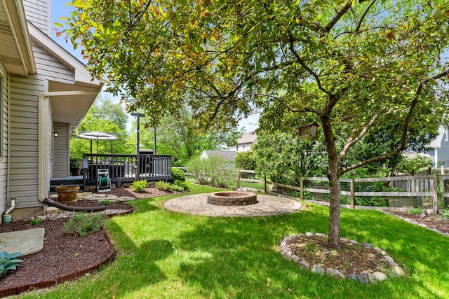 807 Meadow Ln, North Aurora, IL 60542 - view of yard with an outdoor fire pit and a wooden deck