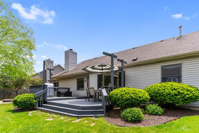 807 Meadow Ln, North Aurora, IL 60542 - rear view of property with a wooden deck and roof with shingles