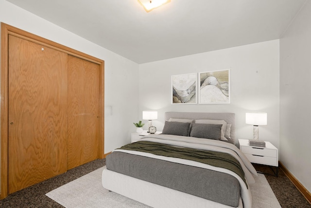 2820 W 100th Pl, Evergreen Park, IL 60805 - bedroom with carpet, a closet, and baseboards