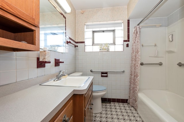 2820 W 100th Pl, Evergreen Park, IL 60805 - bathroom featuring tile walls, toilet, vanity, shower / tub combo, and wainscoting