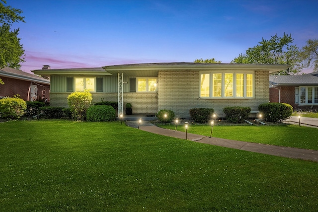 2655 Christina Dr, Lansing, IL 60438 - single story home featuring brick siding and a yard