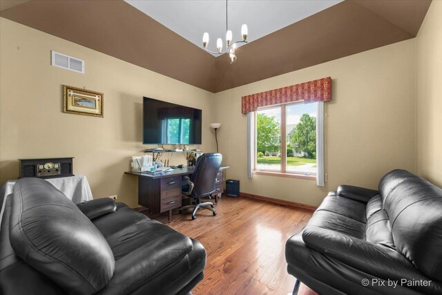 1122 Souders Ave, Elburn, IL 60119 - office featuring a chandelier, wood finished floors, and baseboards