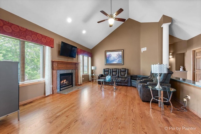 1122 Souders Ave, Elburn, IL 60119 - living room with high vaulted ceiling, a ceiling fan, a premium fireplace, light wood finished floors, and baseboards