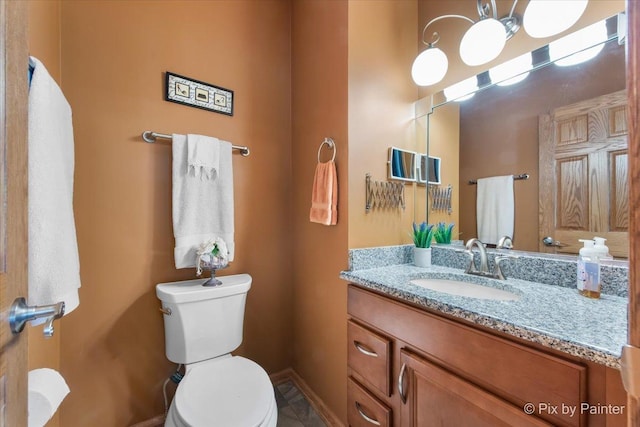 1122 Souders Ave, Elburn, IL 60119 - bathroom featuring vanity, toilet, and baseboards