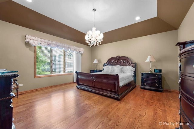 1122 Souders Ave, Elburn, IL 60119 - bedroom with a chandelier, wood finished floors, baseboards, and recessed lighting