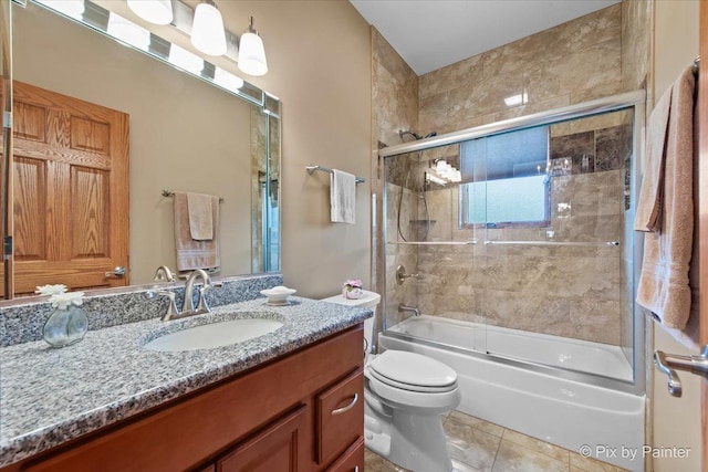 1122 Souders Ave, Elburn, IL 60119 - bathroom with vanity, toilet, bath / shower combo with glass door, and tile patterned flooring
