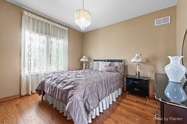 1122 Souders Ave, Elburn, IL 60119 - bedroom featuring wood finished floors and baseboards