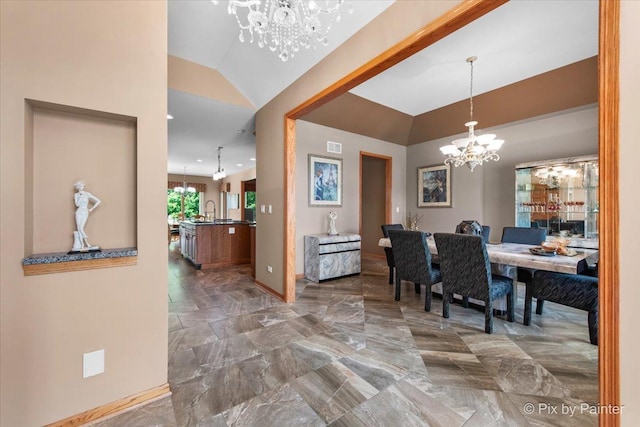 1122 Souders Ave, Elburn, IL 60119 - dining area with a chandelier, vaulted ceiling, baseboards, and marble finish floors